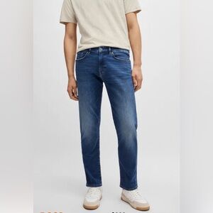 NWOT Hugo Boss darker blue denim straight leg jeans - regular fit.